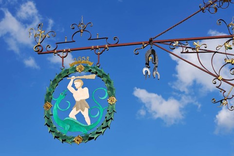 Wrought iron hanging sign from the first half of the 18th century for the brewery restaurant 'Zum Wilden Mann'