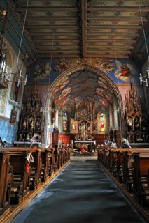 Church interior with the vaulted ceiling of the Parish Church of St. Pelagius