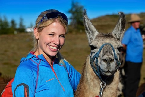 Tourist during a llama tour to the summit of Boeses Weibele Mountain in the Defregger Group