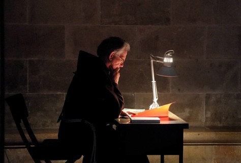 Cleric studying books