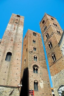 Bell tower of San Michele Cathedral and the towers of Torre del Comune and Torre del Municipio