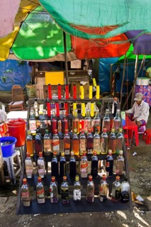 Stand selling gasoline in bottles