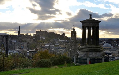 View from Calton Hill with the Dugald Stewart Monument on the Edinburgh Castle and the historic city center