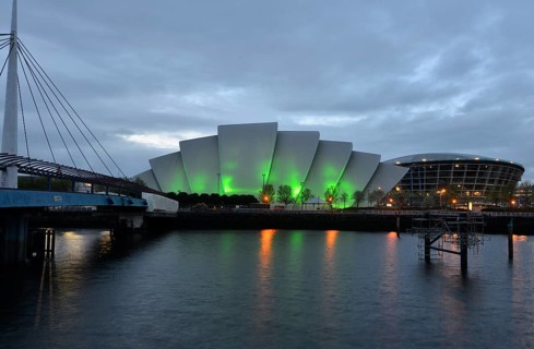 Illuminated Clyde Auditorium with the Bell Bridge and The Hydro arena on the River Clyde