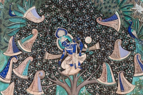 Pastoral god Krishna playing on his flute after he has hidden the clothes of the shepherd girls in a tree