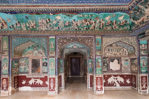 Wall paintings or frescoes painted with natural colours from the Bundikalam school of painting