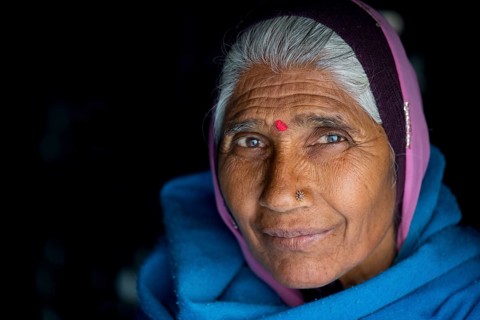 Mature woman with red bindi on her forehead