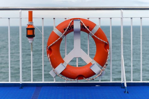 Lifebuoy on the railing on the Norrona ferry