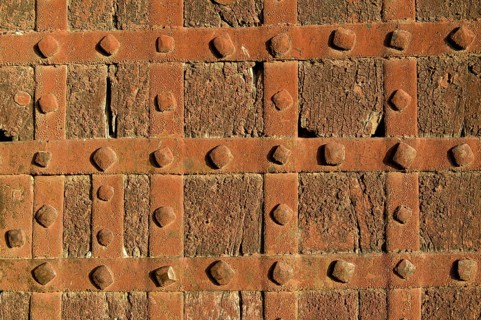 Iron mountings and hand-forged nails on an old door