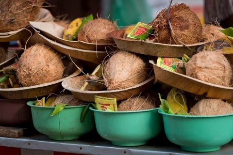 Offering bowls with coconuts