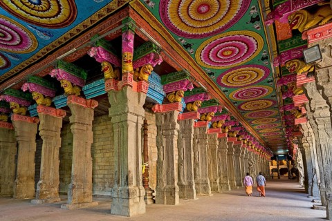 Colourful painted ceiling on stone pillars