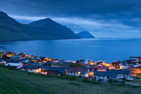 Bay and houses in the blue hour