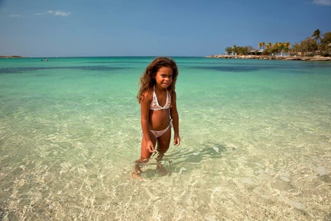 Little Cuban girl on Playa Bacuranao beach