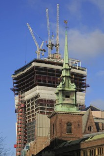 Tower of All Hallows by the Tower Church in front of the high-rise construction site of 20 Fenchurch Street