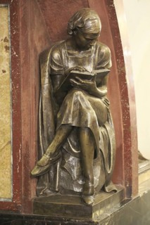 Bronze statue of a female student