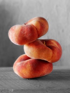 Donut peaches piled on top of each other