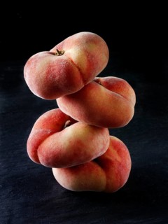 Donut peaches piled on top of each other
