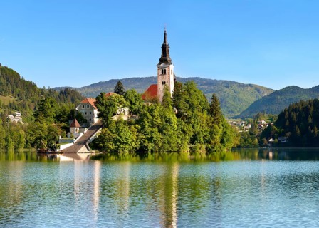 Cerkev Marijinega vnebovzetja or Assumption Church on Bled Island in the middle of Lake Bled