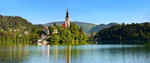 Cerkev Marijinega vnebovzetja or Assumption Church on Bled Island in the middle of Lake Bled