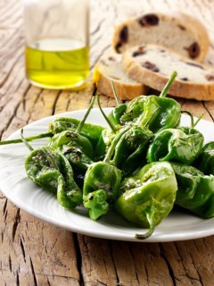 Whole griddled Padron peppers with sea salt