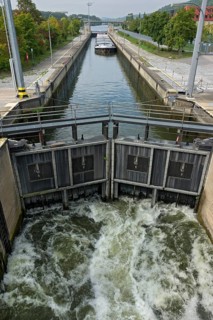 Cargo ship being lowered into a sluice