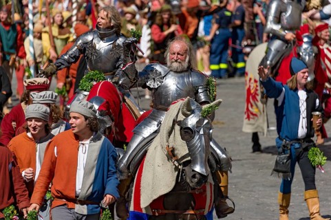 Knights wearing armour on horseback