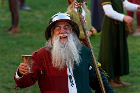 Bailiff holding a cup wearing a medieval costume at the showgrounds