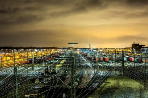 Parked goods wagons on the tracks of the Maschen marshalling yard at night