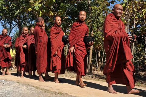 Buddhist monks collecting alms