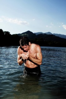 Man standing in a lake in Sonthofen