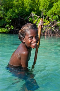 Local boy in the water of the Marovo Lagoon