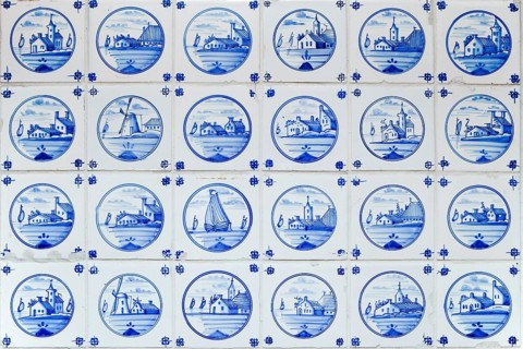 Old hand-painted Delftware tiles in a heated women's room in the only house on Suederoog Hallig