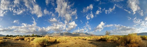 Desert landscape with a cloudy sky in the morning at the foot of the Sierra Nevada mountains