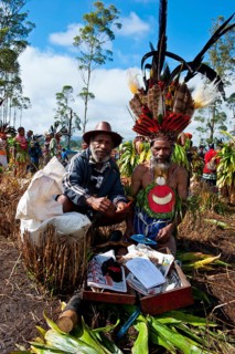 Members of a tribe in colourfully decorated costumes at the traditional sing-sing gathering