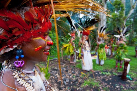 Tribe with colourful decorations and face paint is celebrating at the traditional Sing Sing gathering in the highlands