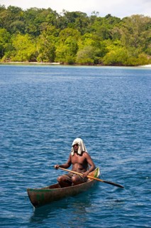 Man paddling in his canoe