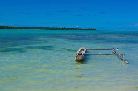 Outrigger in the turquoise waters