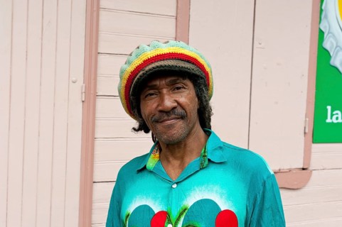 Smiling Creole man with a colourful hat