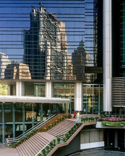 HSBC Building reflected in a glass facade