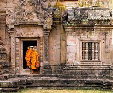 Monks in the temple ruins of Phanom Rung