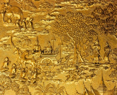 Gilded relief on the facade of Wat Mai Temple
