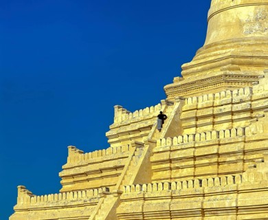 Man on the stairs of Shwesandaw Pagoda