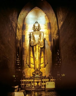 Golden standing Buddha statue in Ananda Temple