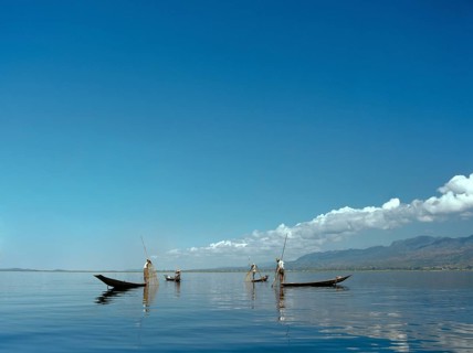 Leg rowers with creels on Inle Lake