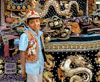 Boy with traditional textile art