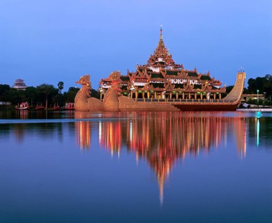 Karaweik ship restaurant on Lake Kandawgyi at dusk