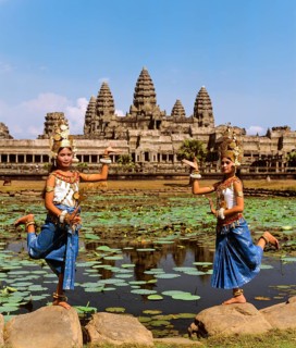 Temple dancers or apsaras at the Lotus Pond in front of the temple of Angkor Wat
