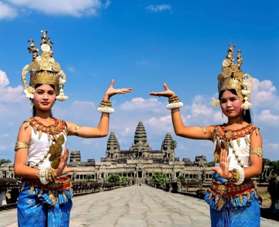Temple dancers or apsaras on the western promenade in front of the temple of Angkor Wat