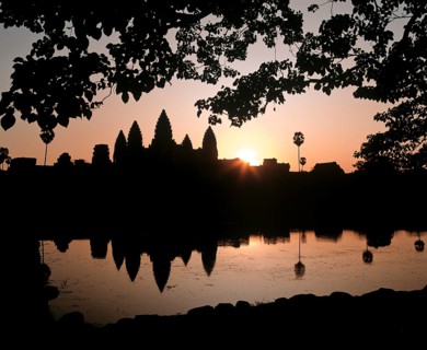 Main temple of Angkor Wat reflected in a pond