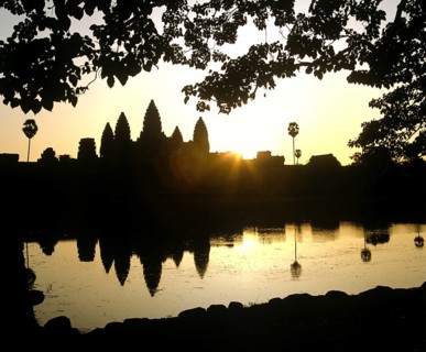 Main temple of Angkor Wat reflected in a pond